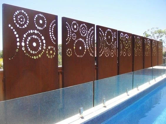 Corten steel panels decorated with circles Corten steel panels decorated with circles